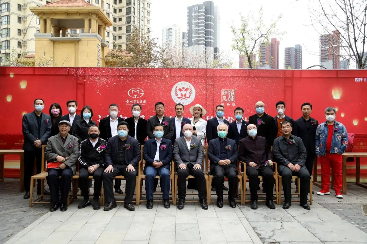 Group of people posing outdoors in support of healthcare workers during COVID-19 pandemic