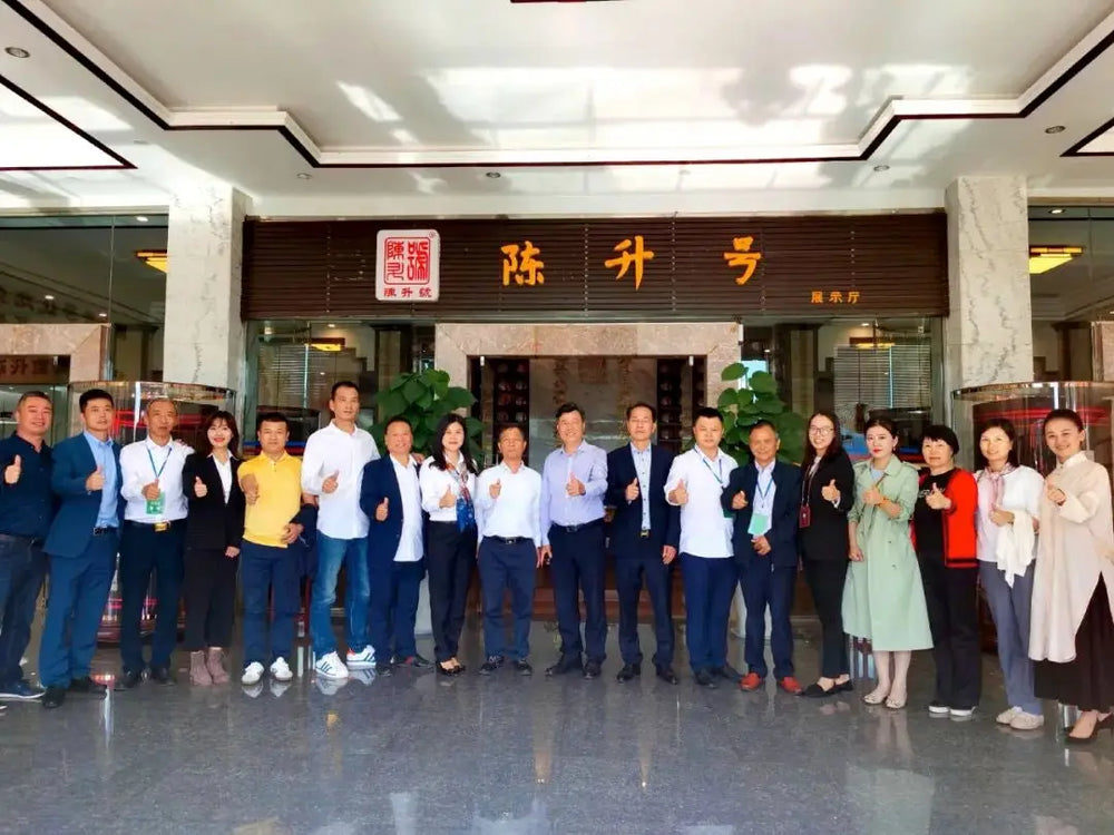Group of people posing at the 2020 China Tea Industry Annual Ceremony celebrating Chen Sheng Hao