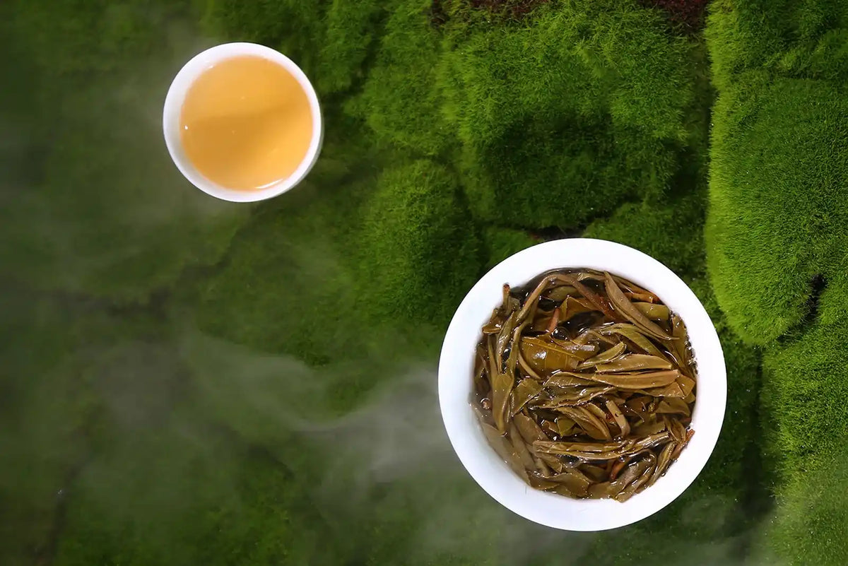 Freshly brewed tea with loose leaves.
