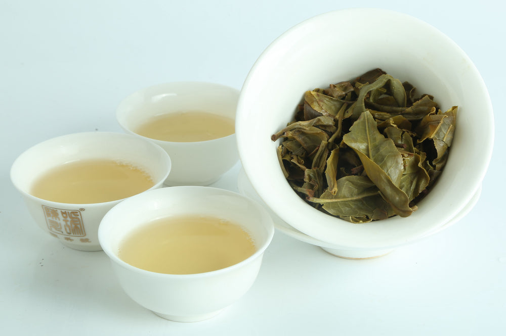 
                  
                    Chen Sheng Hao 2017 Chen Sheng #1 Raw Pu'er Tea Soup and Steeped Tea Leaves
                  
                